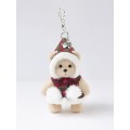 Lina Медведь молочный в Плаще с помпонами брелок  XS (±15 см)
